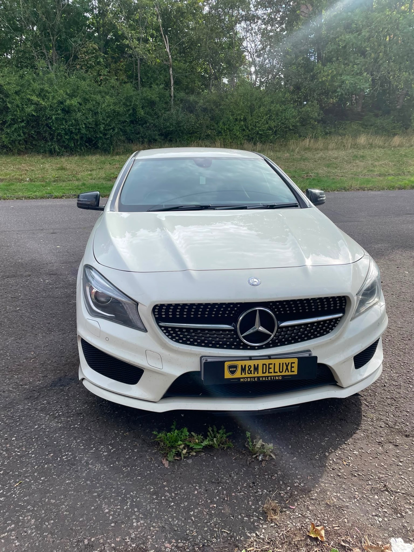 White Mercedes after an M&M Deluxe mobile valet